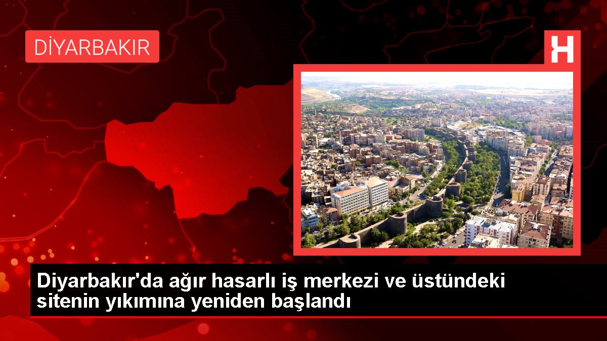 Diyarbakır'da ağır hasarlı iş merkezi ve üstündeki sitenin yıkımına tekrar başlandı