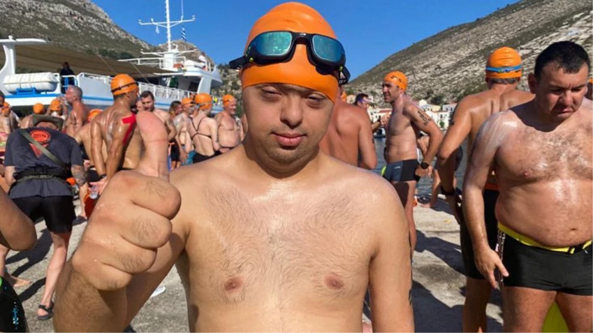 Down sendromlu sportmen Gökhan Kotan'dan dünyada bir ilk! 7 kilometreyi yüzerek geçti